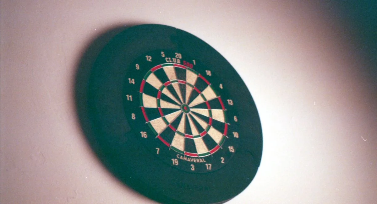 Detailed image of a dartboard with neutral lighting, ideal for game or sport themes.